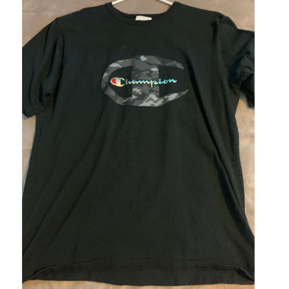 A black champion shirt